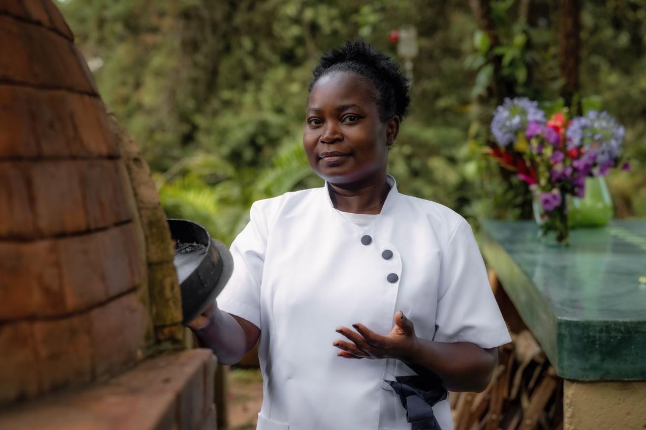 Carol at the wood-fired oven
